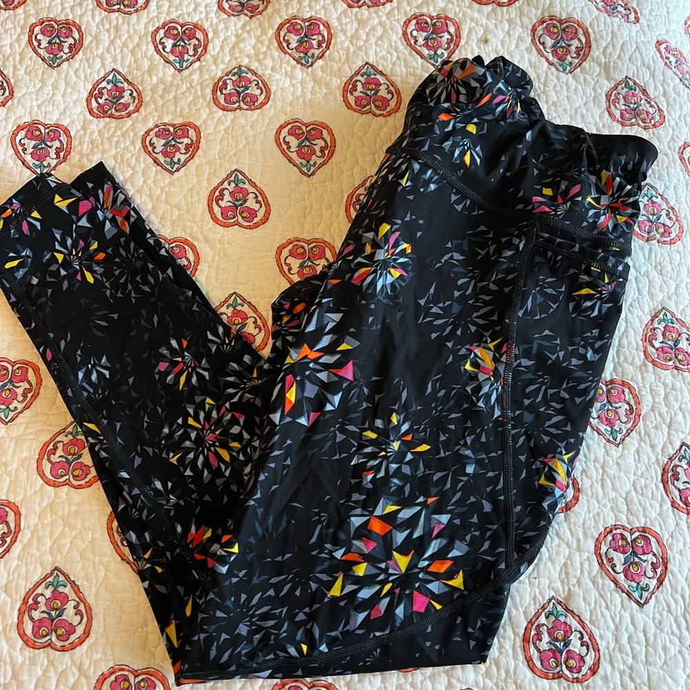 Sweaty Betty Black Stretchy Leggings with Vibrant Patterns
